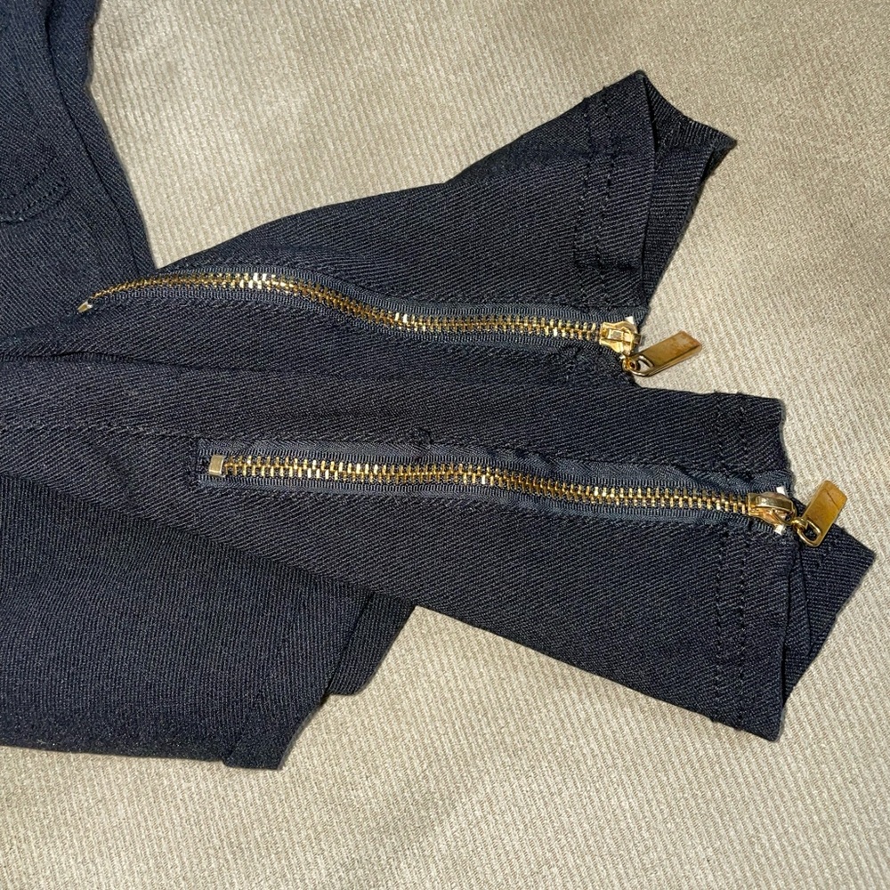 Black jegging size large. Textured and zipper bottoms. Cute with heels. - Picture 6 of 6